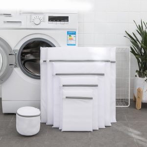 Laundry bags protecting and cleaning clothes during washing