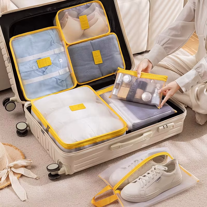 Suitcase organized with mesh laundry bags for travel and gym use