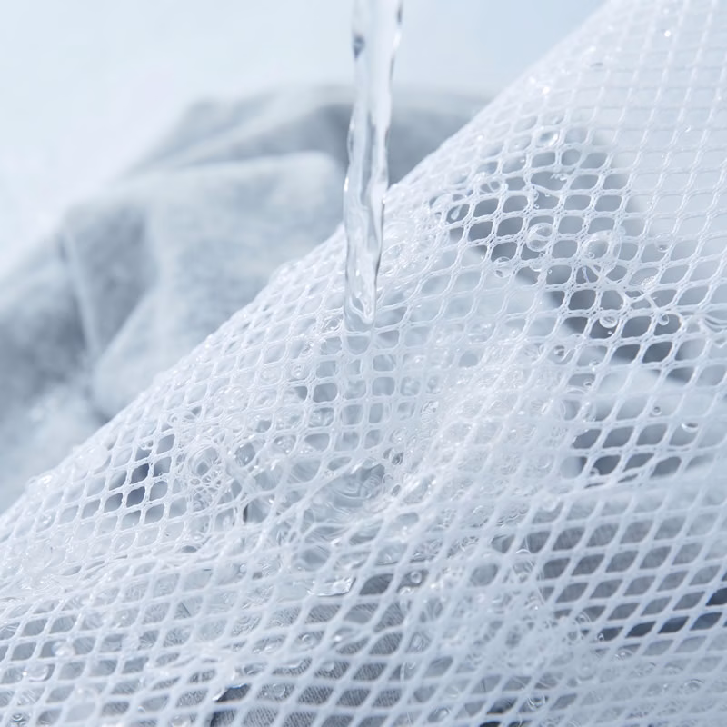 water flow through laundry mesh.